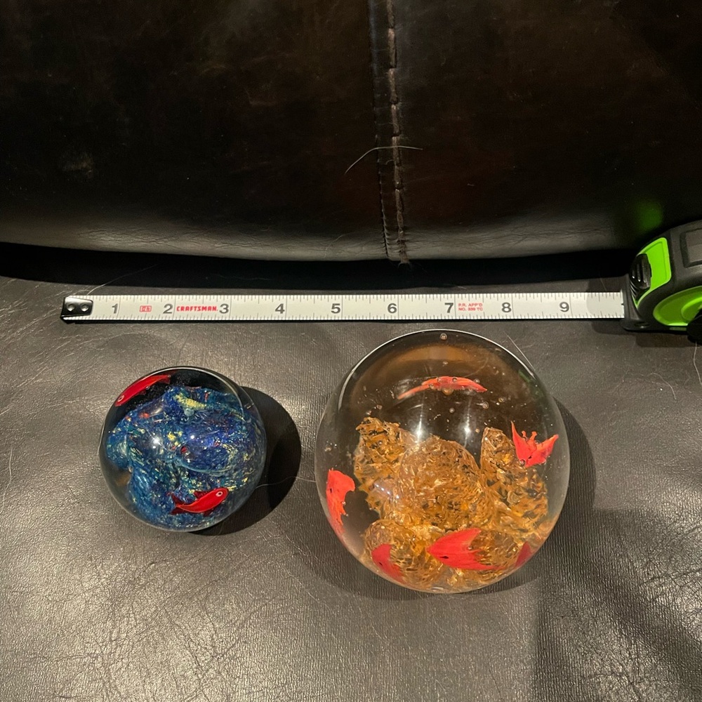 2 fish themed paperweights
